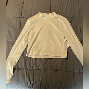 ALTARD STATE mock neck cropped long sleeve top in beige size small